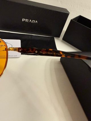 Occhiali da sole Prada oro e arancio
