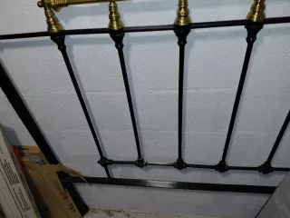 Cabecero antiguo forja y bronce