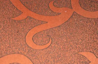 Sofá de 2 plazas tela marrón y naranja