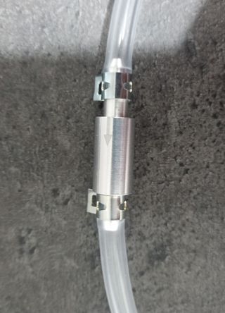 Pulgador de frenos con manguera