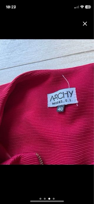 Chaqueta tweed roja y regalo falda