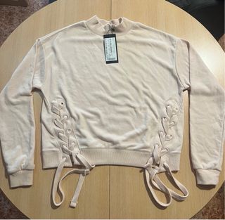 Jersey moda lazo cuello alto rosa