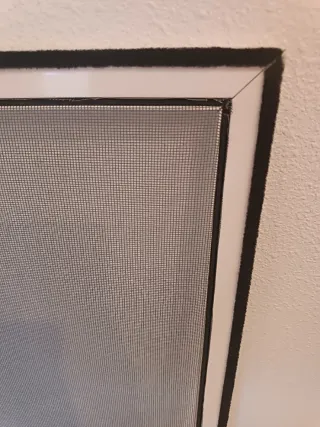 MOSQUITERA con marco de color blanco