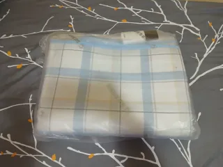 Manta eléctrica azul y blanca