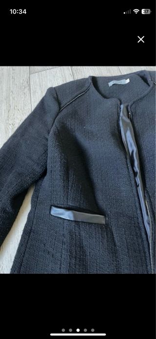 Chaqueta negra y regalo falda