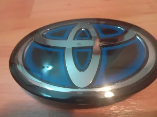 Emblema Toyota Corolla E21 Paragolpes Delantero