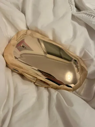 Bolso de fiesta dorado y plateado