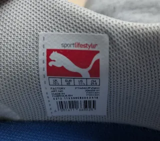 Zapatillas Puma Blancas con detalles Azules