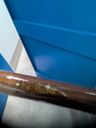 Tacos de billar con firma