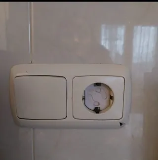 Marco doble Niessen Interruptor + Enchufe