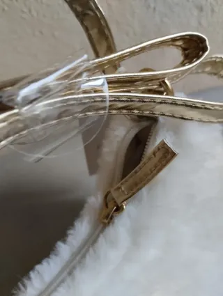 Bolso infantil crema y dorado Primark