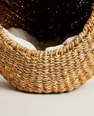 Cama para mascota pequeña con cojín