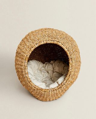 Cama para mascota pequeña con cojín