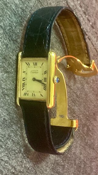 Reloj Cartier Tank Must Negro y Dorado