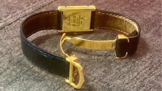 Reloj Cartier Tank Must Negro y Dorado