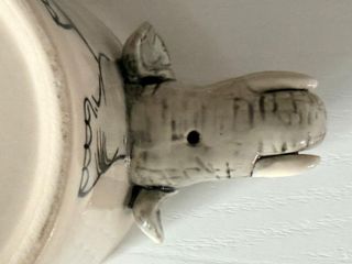 Tazza con manico a forma di elefante