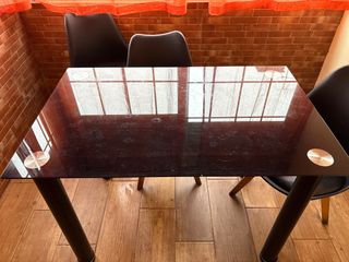 Mesa de comedor de cristal negra