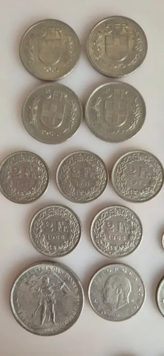 Lote monedas francos suizos y otras