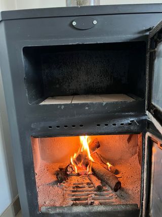 Estufa de leña FM Negra y Plateada
