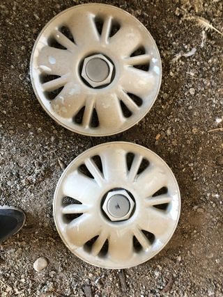 2 Tapacubos Chrysler Voyager 15