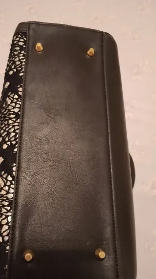 Bolso de vestir negro y plateado