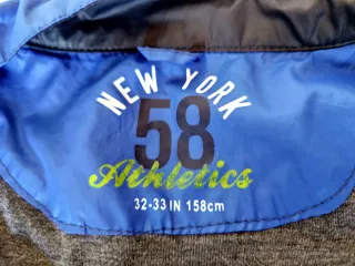 Casaco Corta Vento para Rapaz - Rebel (12-14 anos)