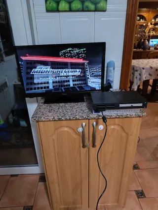 Lote PlayStation 2 + Juegos y Mandos