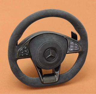 Tapizado de volantes en cuero natural y ecocuero