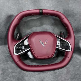 Tapizado de volantes en cuero natural y ecocuero