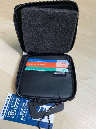 Porta carte Tucano vera pelle zip blu