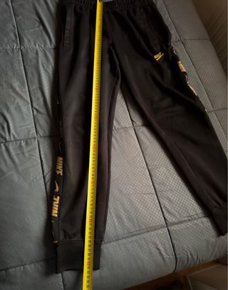 Pantalón chándal Nike Negro/Dorado Talla XS