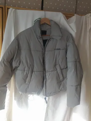 Cazadora reflectante gris