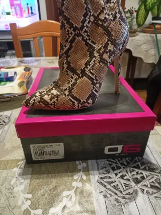 Stivali donna pitonati tacco alto