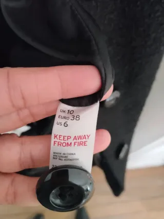 Abrigo Topshop negro cuello leopardo