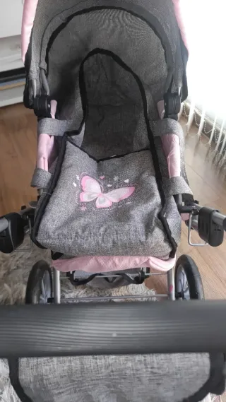Cochecito de muñecas gris y rosa