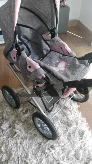 Cochecito de muñecas gris y rosa