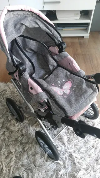 Cochecito de muñecas gris y rosa