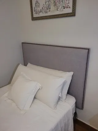 Cabecero tapizado gris