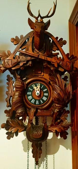 Orologio a cucù in legno settimanale