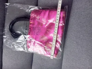 Bolso de fiesta Avon fucsia y dorado