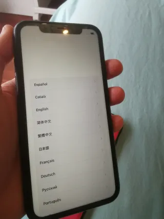 iPhone 11 Negro con 3 fundas