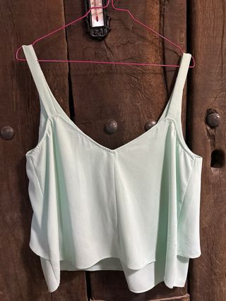 Blusa con capa