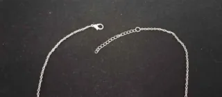 Collar con colgante de búho plateado