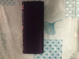 Bolso de mano tipo clutch morado