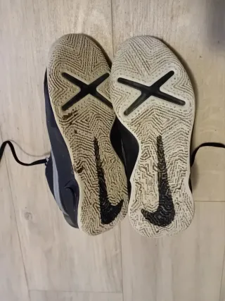 Scarpe Nike Hustle nere e argento