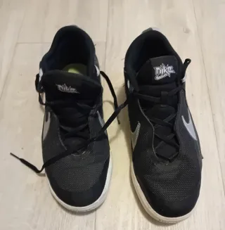 Scarpe Nike Hustle nere e argento