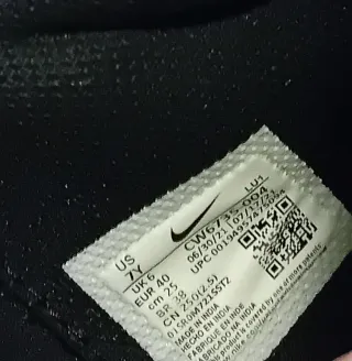 Scarpe Nike Hustle nere e argento