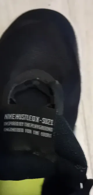 Scarpe Nike Hustle nere e argento