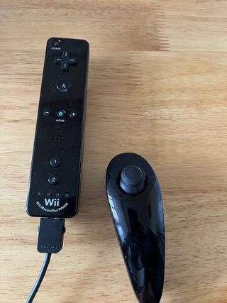 Nintendo Wii como Nueva y 2 juegos y mando pro