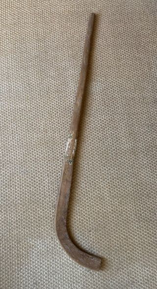 Botas, taco e bola de Hóquei anos 50